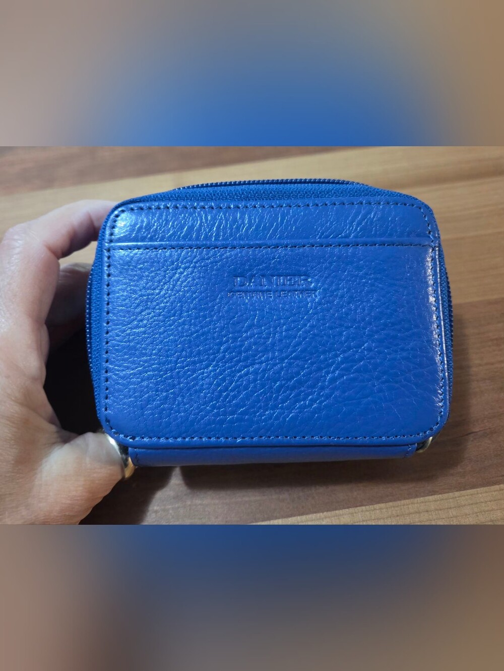 BNWOT Danier Leather Women's Zip Wallet With A Crossbody Strap.